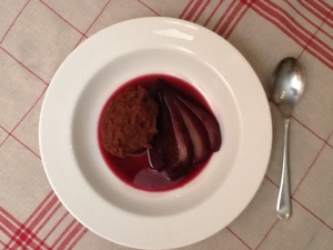Chocolate pudding with pears in red wine
